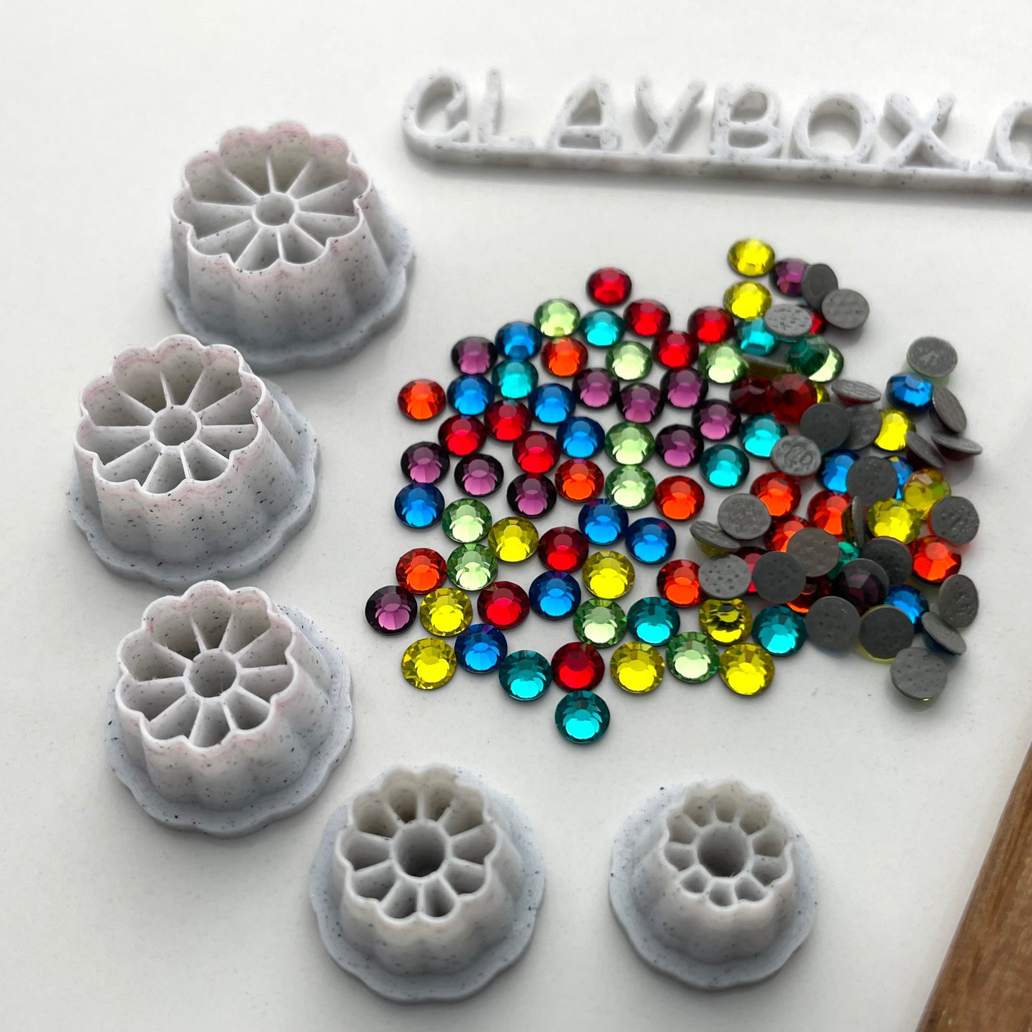 Teeny daisy cutters with Preciosa crystals - made for use with polymer clay