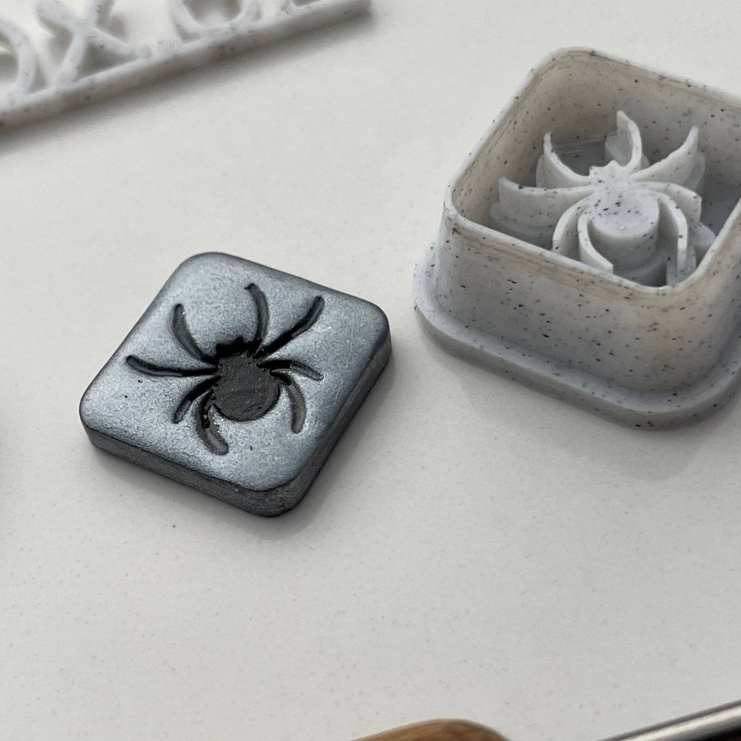 Spiderweb and spider cutter pair