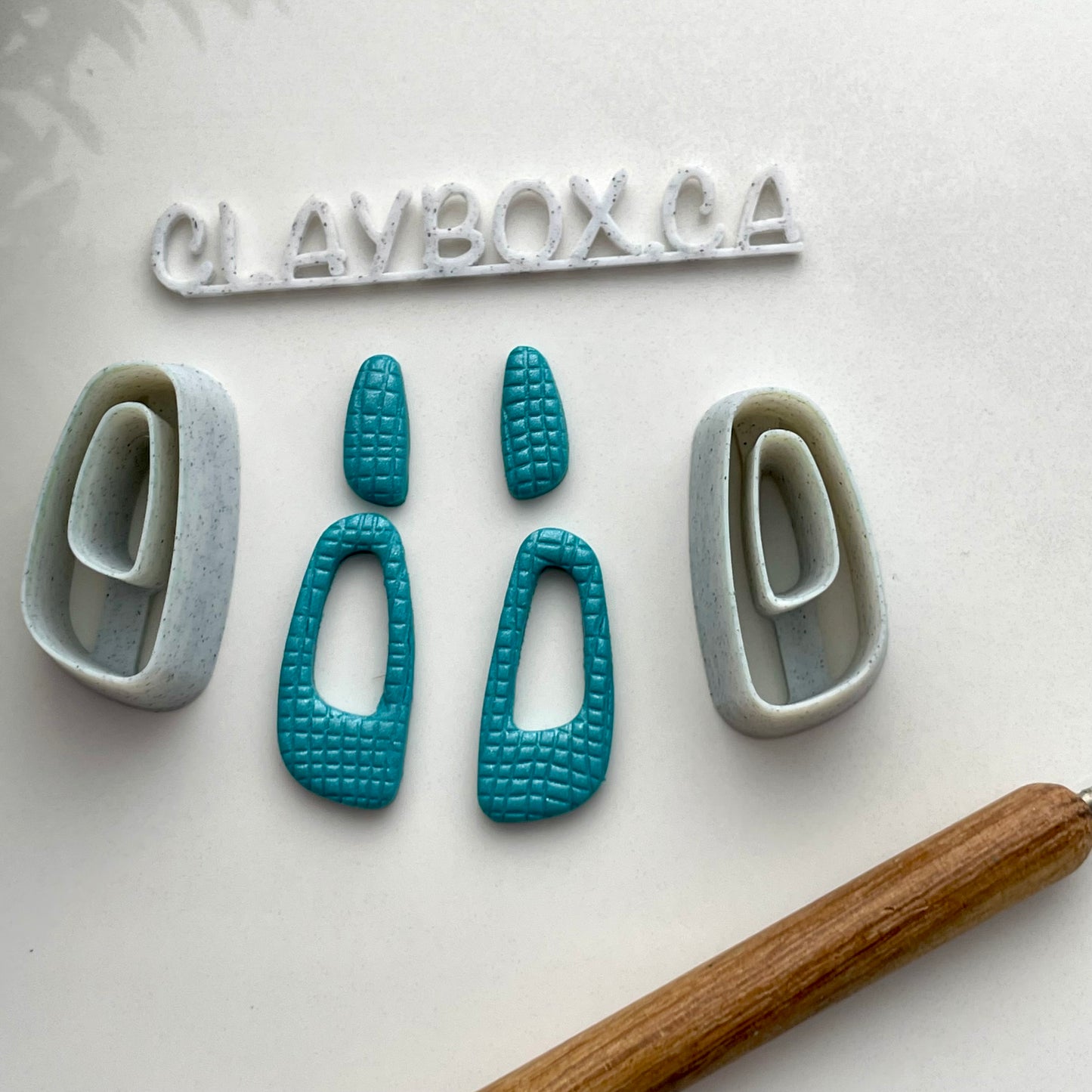 Organic dangle donut cutter pair