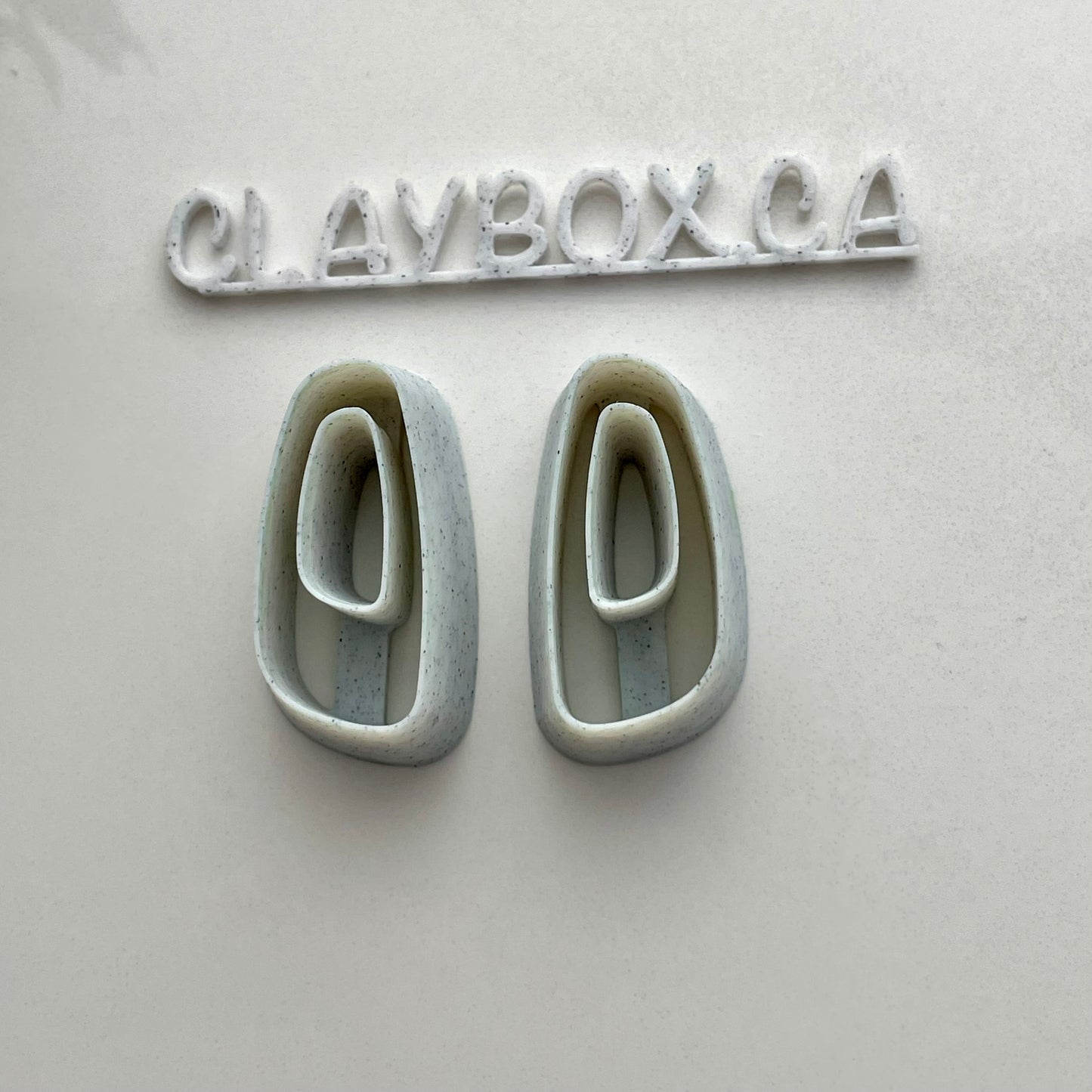 Organic dangle donut cutter pair
