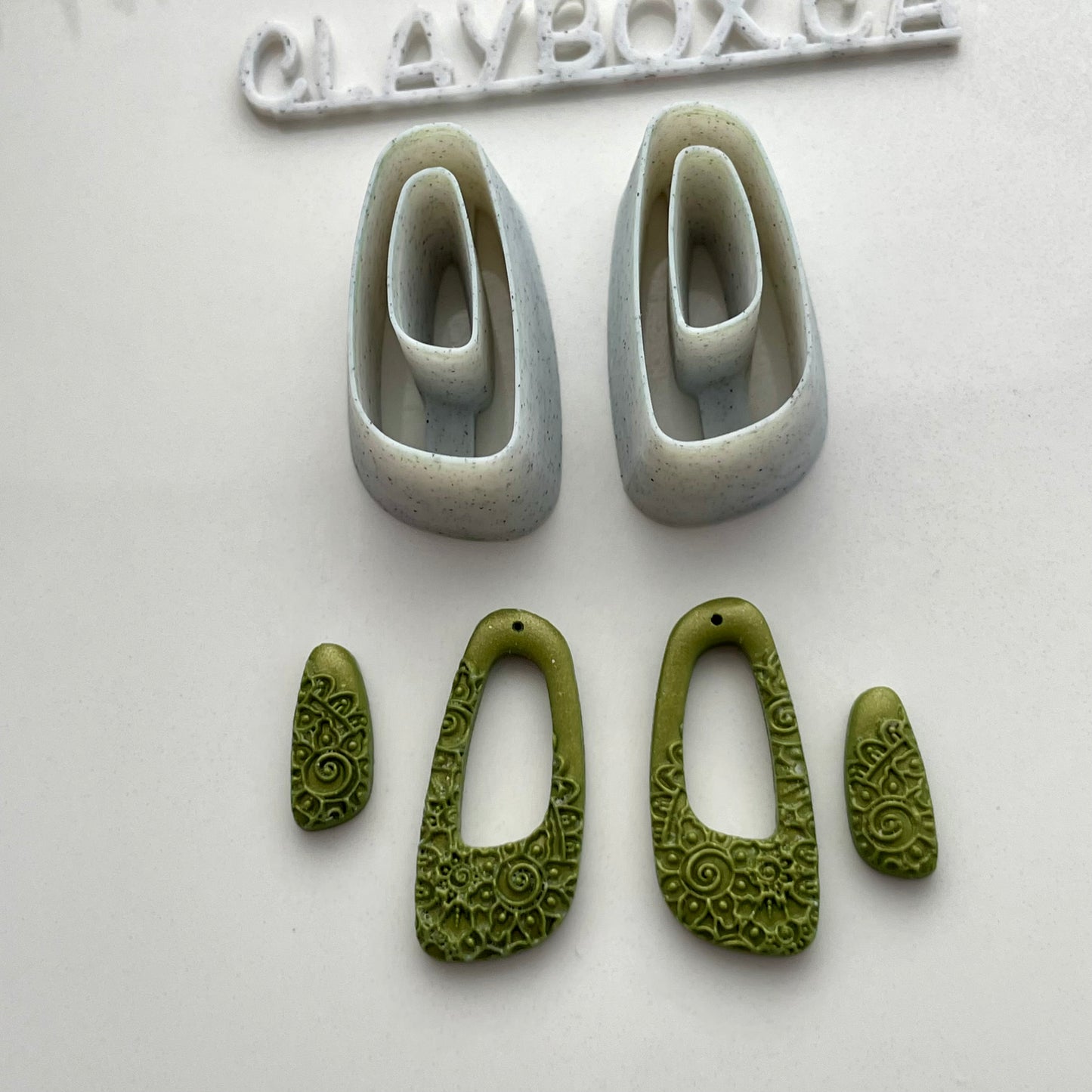 Organic dangle donut cutter pair