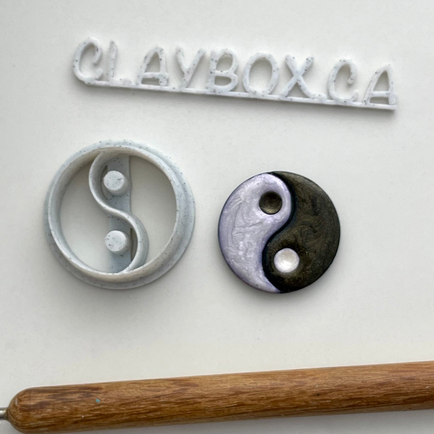 Yin yang combined stamp/cutter