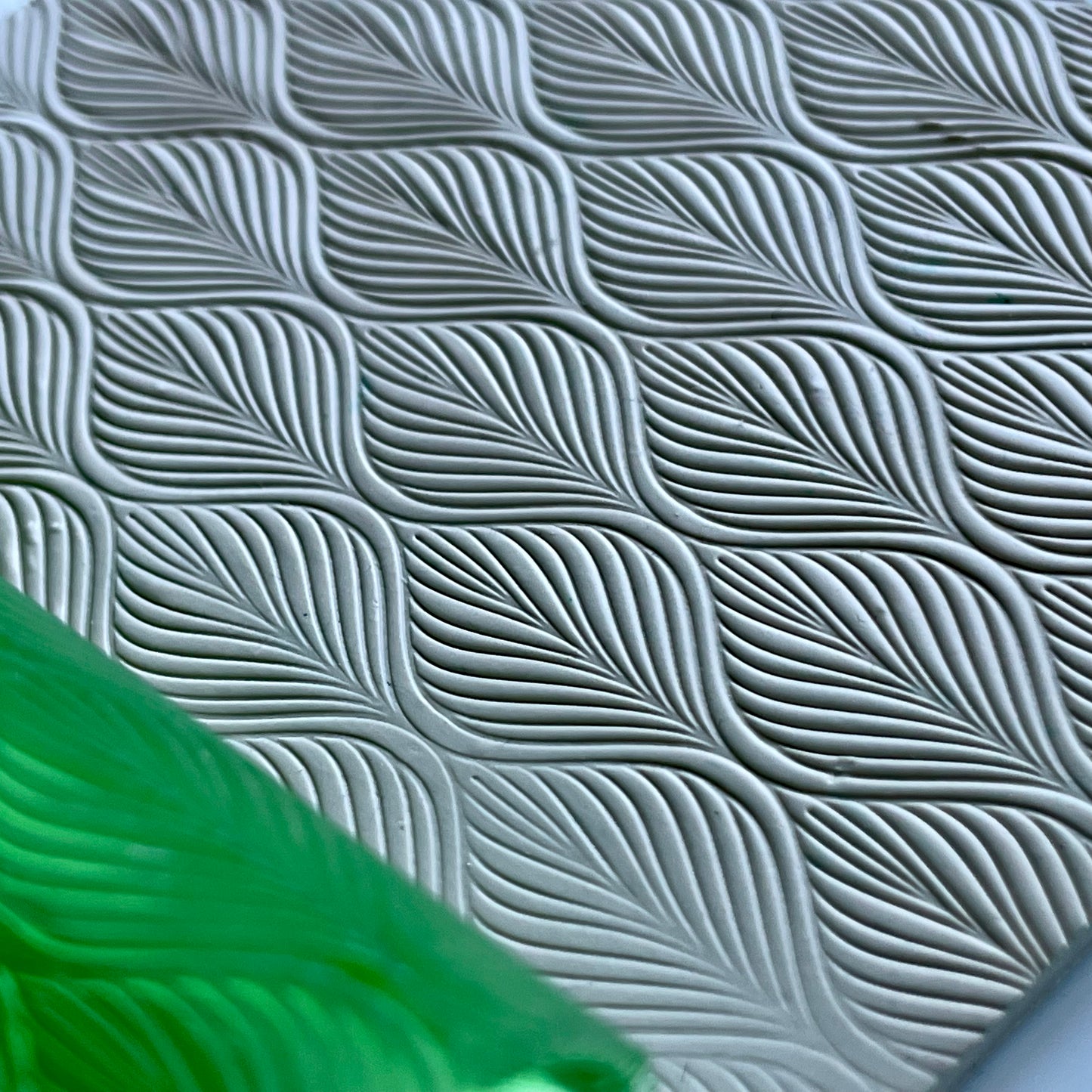Feather roller
