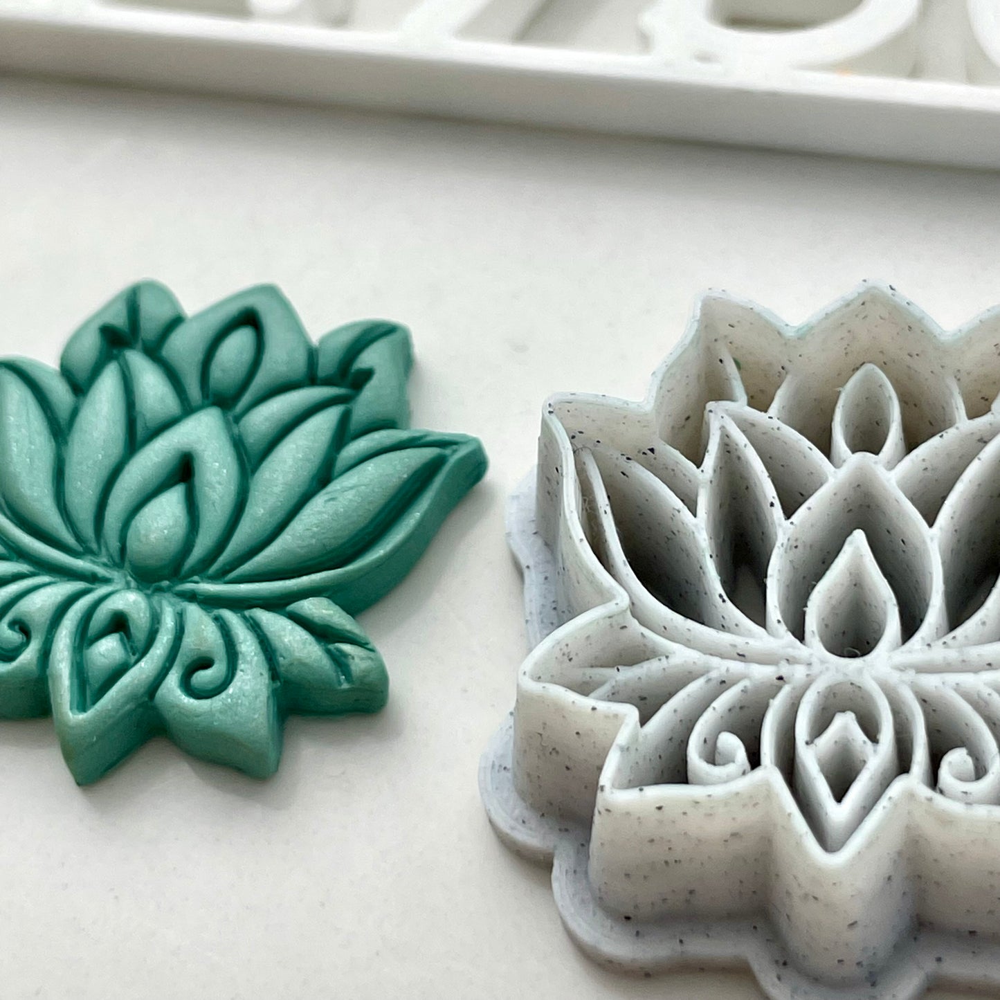 Lotus combined stamp/cutter