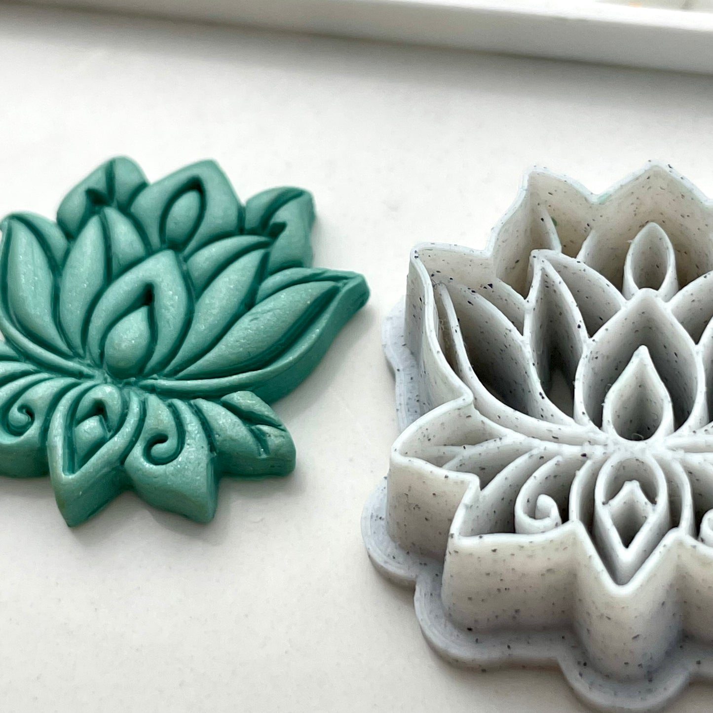 Lotus combined stamp/cutter
