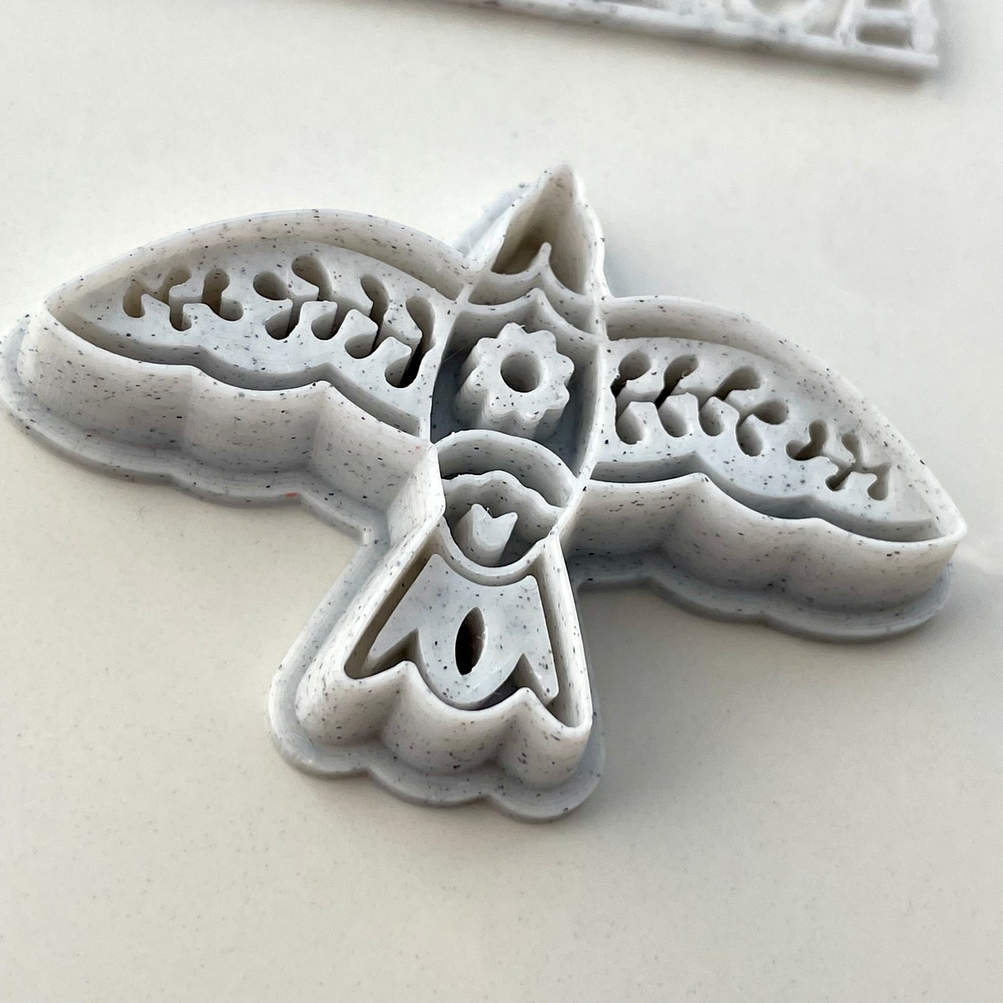 Spring folk art bird combined stamp/cutter